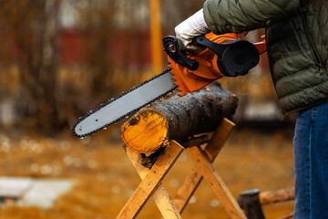 Close Up of chainsaw cutting a piece of wood.