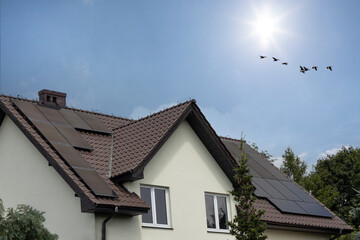 House with Solar Panels and Clear Sky