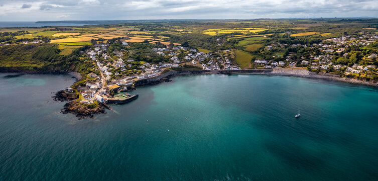 Aerial view of the Cornish fishing village of Coverack and its historic harbour