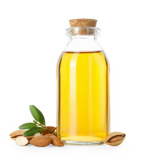 Bottle of almond oil, fresh nuts and green leaves isolated on white