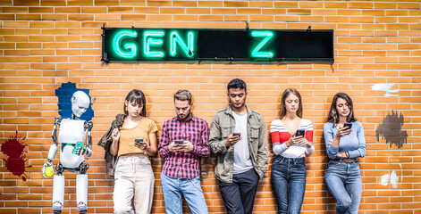 Generation Z standing against a brick wall with smartphones and a humanoid robot. A diverse group...