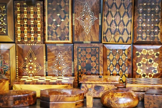 Decorative Moroccan wooden boxes decorated with camel bone, brass, souvenirs.
