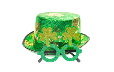 Happy st Patrick's day green decorations glasses with hat isolated over a white background.