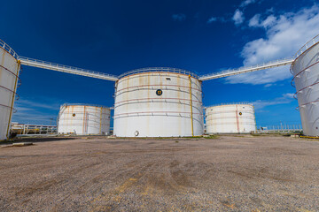 View of the new installation crude oil storage tank in the tank farm. storage tanks can be used to hold materials such