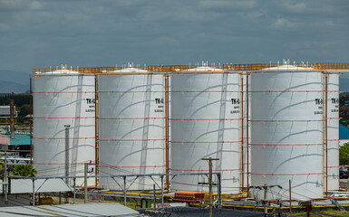 View of the new installation crude oil storage tank in the tank farm. storage tanks can be used to hold materials such