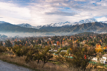 Landscape in autumn with a light fog at the sunset after the rain
Perfect photo of Los Andes in Las Condes,  Santiago, Chile