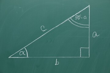 Triangle and geometry task on green board