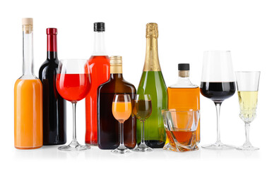 Obraz premium Bottles and glasses with different alcoholic drinks isolated on white