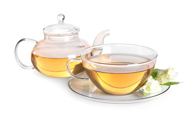 Aromatic jasmine tea in cup, flowers and teapot isolated on white