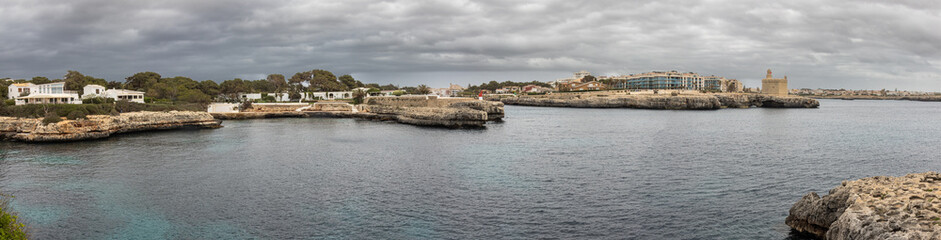 Panoramic photography from the Ciudadela lighthouse, you can see part of the city such as the Castle of San Nicol&aacute;s. Stormy sky. Menorca, Spain