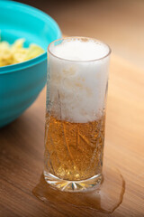 Beer and chips on the coffee table. Preparing to watch something interesting on TV	