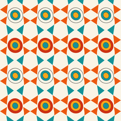 Fototapeta premium A pattern of triangles in blue, orange, and white