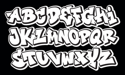 Alphabet in hand-drawn graffiti style. vector graffiti alphabet on a black background