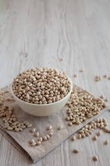 Organic White Beans in a Bowl, side view.