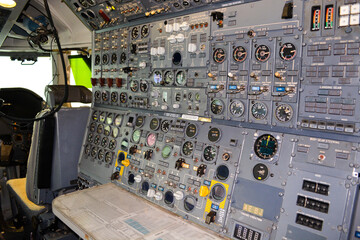 close up shot on helicopter console inside cockpit. Levers, parts and control buttons in the...