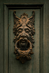 green man, lion head knocker