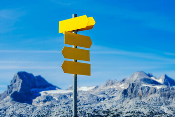 A beautiful view from Krippenstein, Obertraun. Alps, Austria. Tourist signs showing a direction.