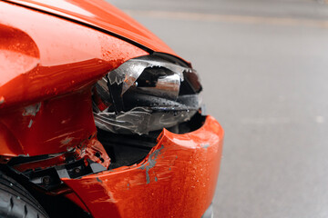 Fototapeta premium Close Up of Damaged Red Car Front End After Accident