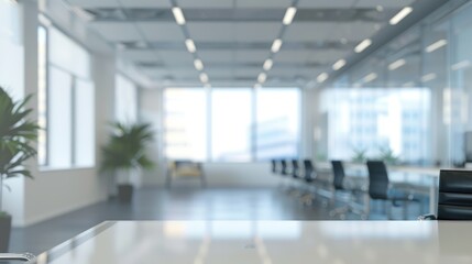 Obraz premium A modern office space with a long table in the foreground and a blurred view of chairs and windows.