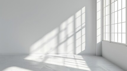 Fototapeta premium A white room with a large window allowing sunlight to stream in and cast shadows on the floor and walls.