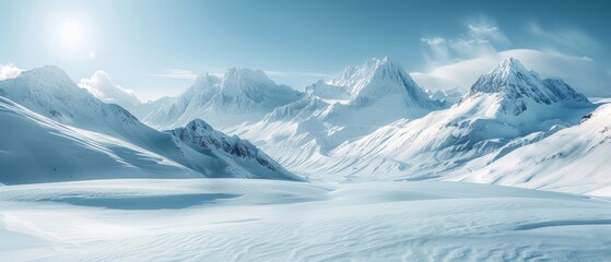 Obraz premium Snowy mountain landscape with a clear blue sky