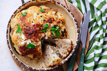 Whole baked cauliflower with minced meat and sauce..selective focus