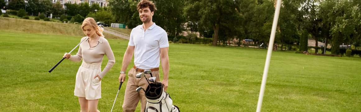 A young couple in elegant attire stands together on a golf course, embracing the upper-class lifestyle of old money.
