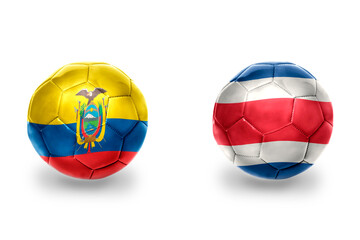 Obraz premium football balls with national flags of ecuador and costa rica ,soccer teams. on the white background.