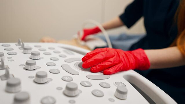 close up In a gynecological office in a clinic doctor conducts an ultrasound of a patient s small organs