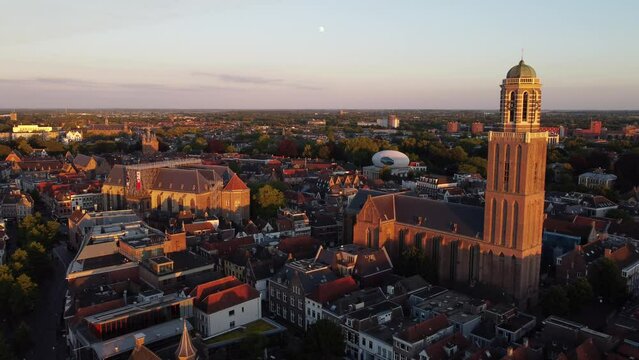 Zwolle, the Netherlands - June 19th, 2024: aerial footage of  the medieval 'Peperbus' tower and citycenter during the golden hour.