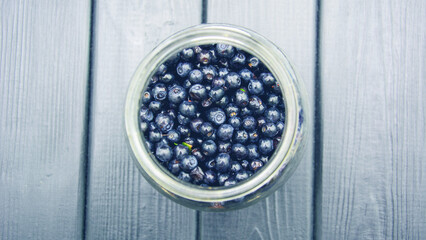 Fresh tasty aromatic blueberries on a beautiful background