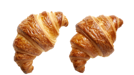 Top view of two croissants lying next to each other as a separate object on a transparent background. PNG Image.