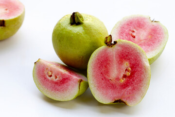 Fresh pink guava on white background.