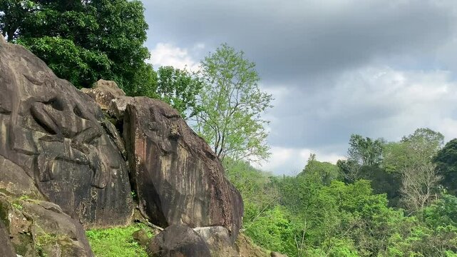 Unakoti a hindu archaeological site of bas relief structures from the ninth century. A must visit tourist destination in Tripura state of India.