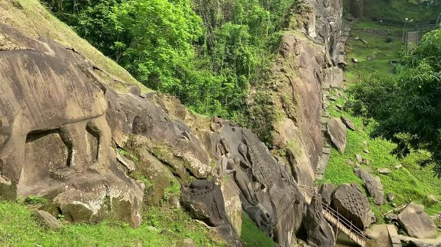 Unakoti a hindu archaeological site of bas relief structures from the ninth century. A must visit tourist destination in Tripura state of India.
