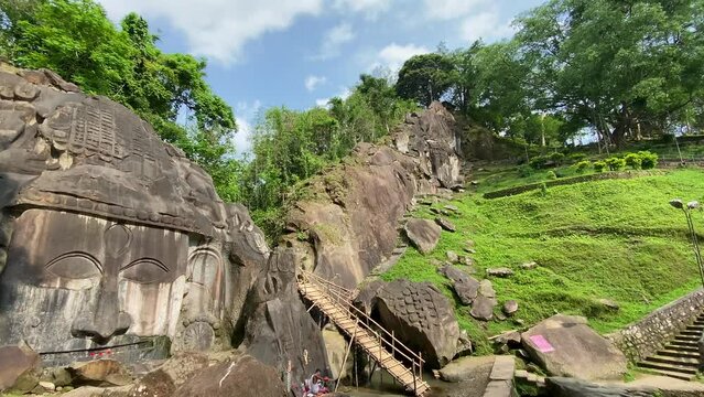 Unakoti a hindu archaeological site of bas relief structures from the ninth century. A must visit tourist destination in Tripura state of India.