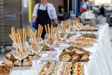 catering buffet with variety of snacks and appetizers at luxury event