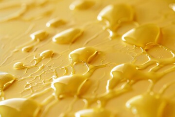 Close-up of Drops on Yellow Substance with Texture