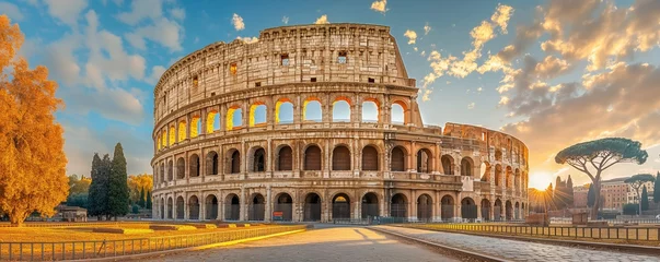 Papier peint photo intissé A wide panoramic shot that captures the full circle of the Colosseum against a dramatic sky at sunrise or sunset