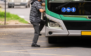 People get on the bus, use transport, bus stop