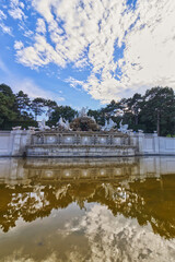 Fototapeta premium Beautiful clouds and blue sky over the man made sculpture Vienna, Austria