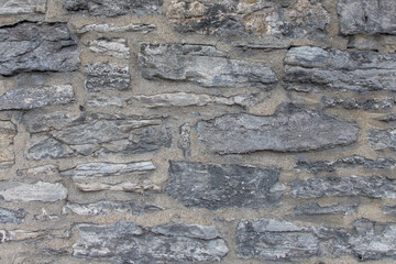 Texture of gray stone wall background