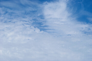 gentle clouds in the blue sky