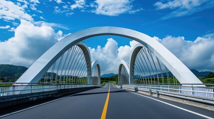 Obraz premium bridge smooth, curved lines contrast beautifully against the straight paths of the road it crosses