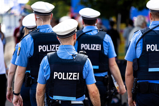 german police officer patroling outdoors background