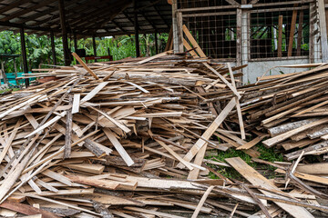 View of a sawmill with legal and illegal wood and firewood