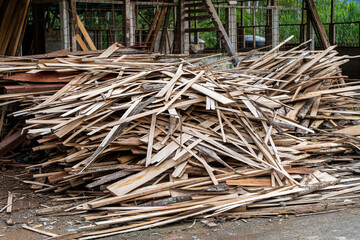 View of a sawmill with legal and illegal wood and firewood