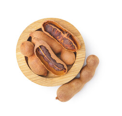 Bowl of tasty tamarinds on white background