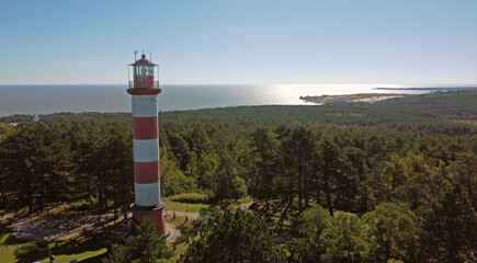 Nida Lighthouse 27 metres high on the Lithuanian part of Curonian Spit between the Curonian Lagoon...