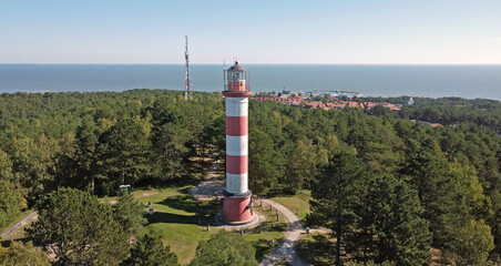 Nida Lighthouse 27 metres high on the Lithuanian part of Curonian Spit between the Curonian Lagoon...